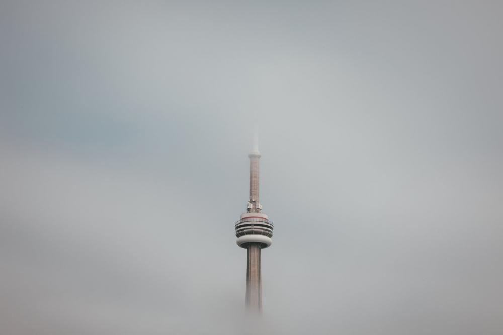 The Toronto Tower Floats In The Clouds Photo The Toronto Tower Floats In The Clouds Photo