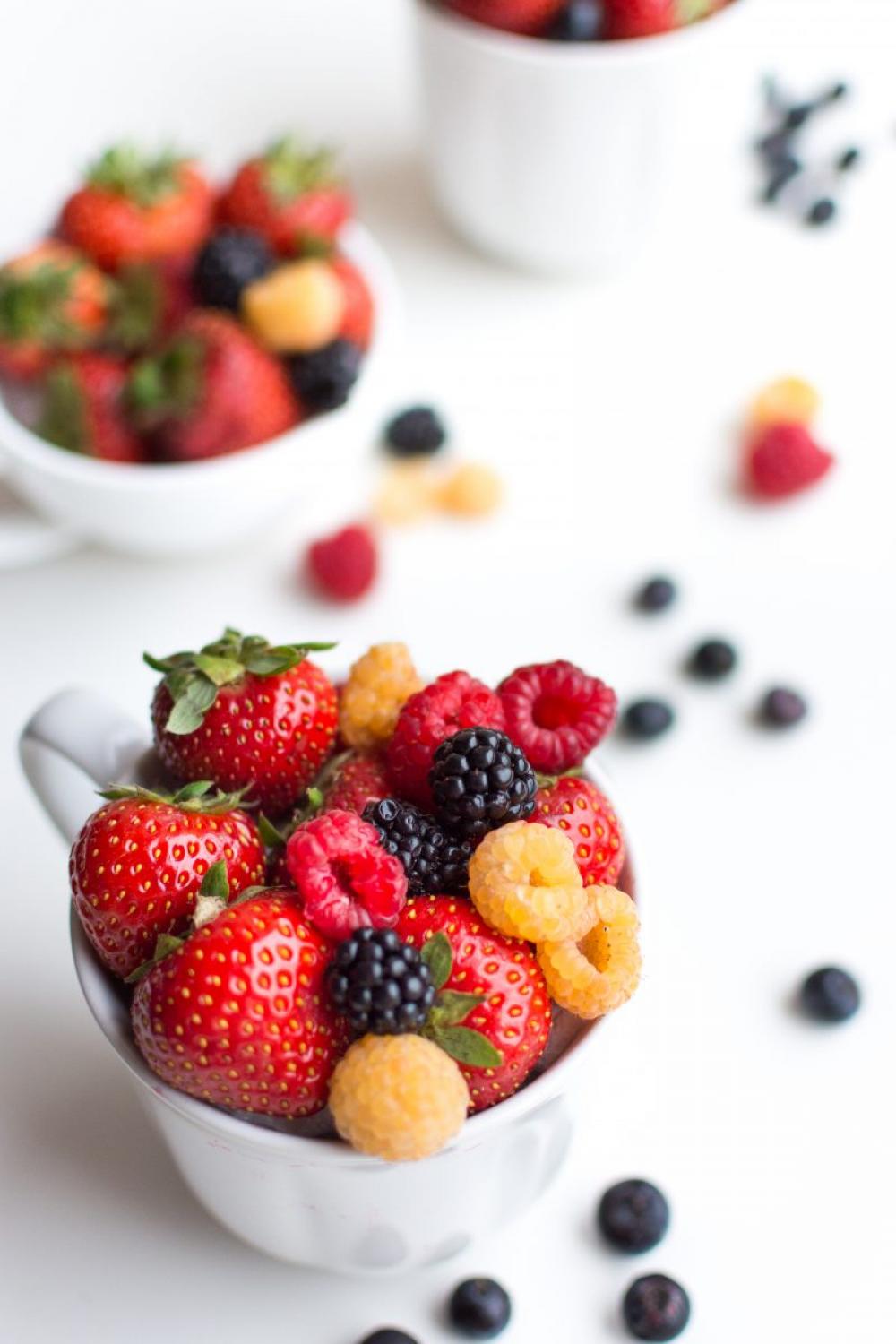 Colorful healthy fresh berries in a cup Colorful healthy fresh berries in a cup