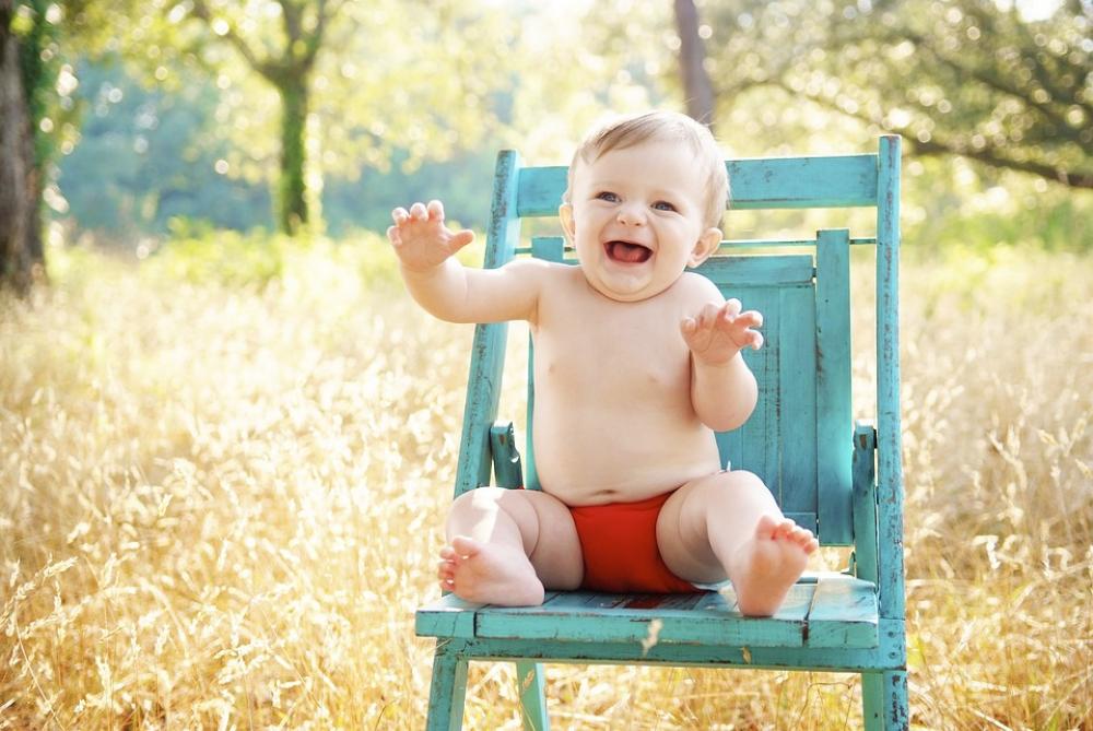 Baby Sitting Smiling Happy Boy Outdoor Blue Chair Baby Sitting Smiling Happy Boy Outdoor Blue Chair