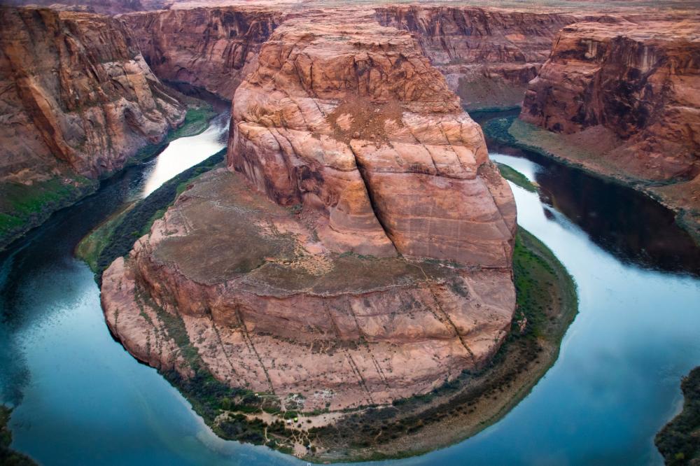 Iconic Rock Carved By Rushing Water Over Thousands Of Years Photo Iconic Rock Carved By Rushing Water Over Thousands Of Years Photo