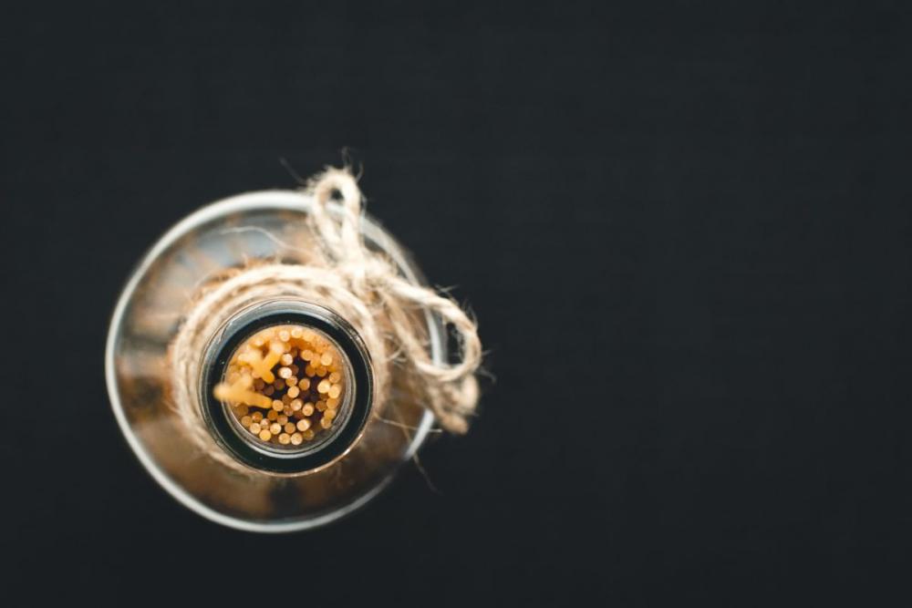 Spaghetti in an empty olive oil glass bottle Spaghetti in an empty olive oil glass bottle