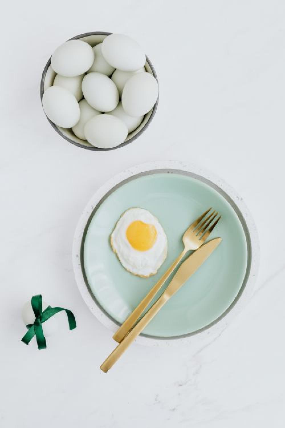 Easter flat lay with eggs on a white marble Easter flat lay with eggs on a white marble