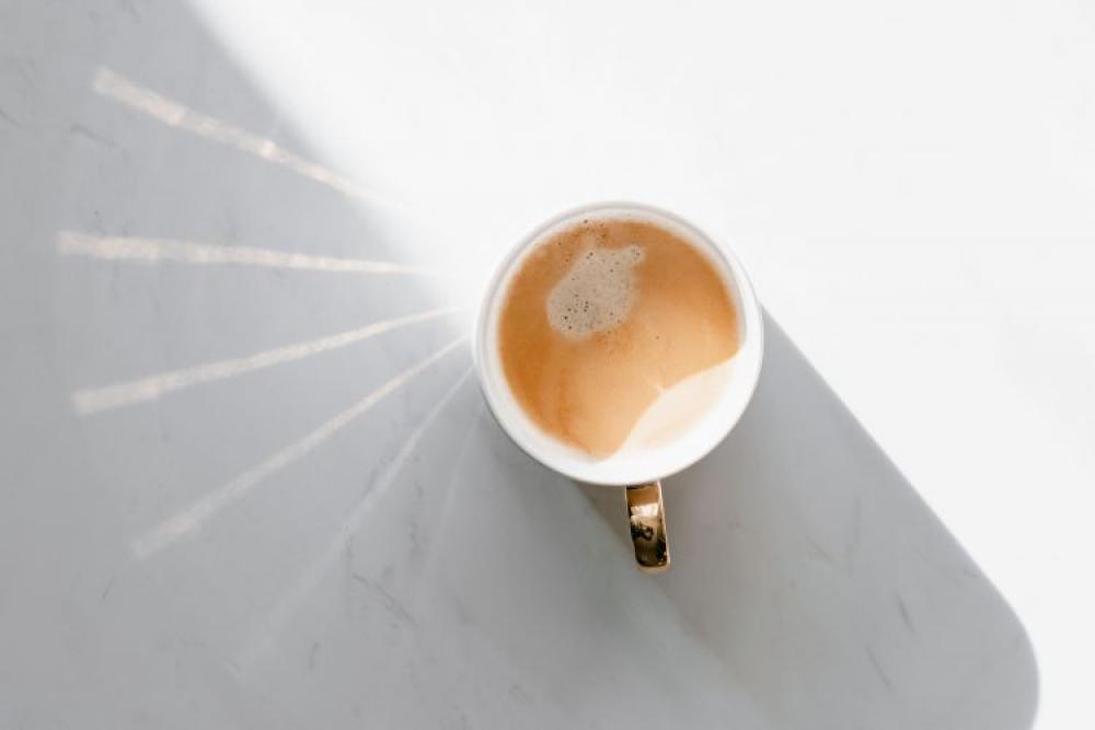 Cup of coffee on white marble Cup of coffee on white marble
