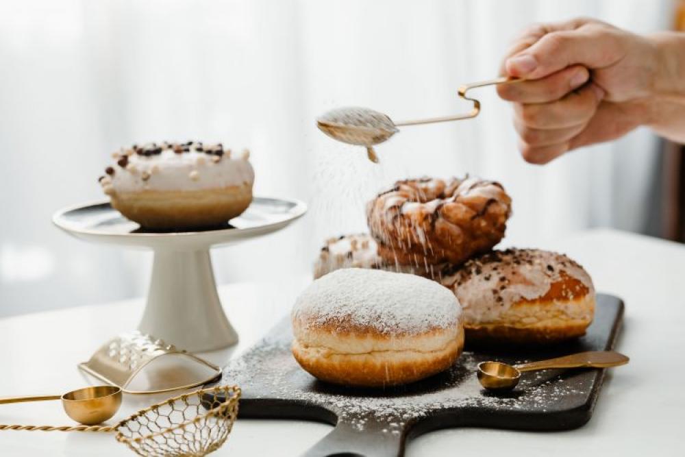 Polish Paczki Donut with Powdered Sugar Polish Paczki Donut with Powdered Sugar