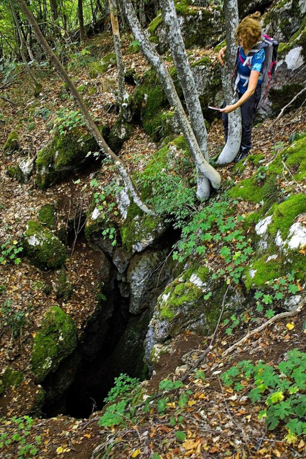 cave woman photography trees rocks cave woman photography trees rocks