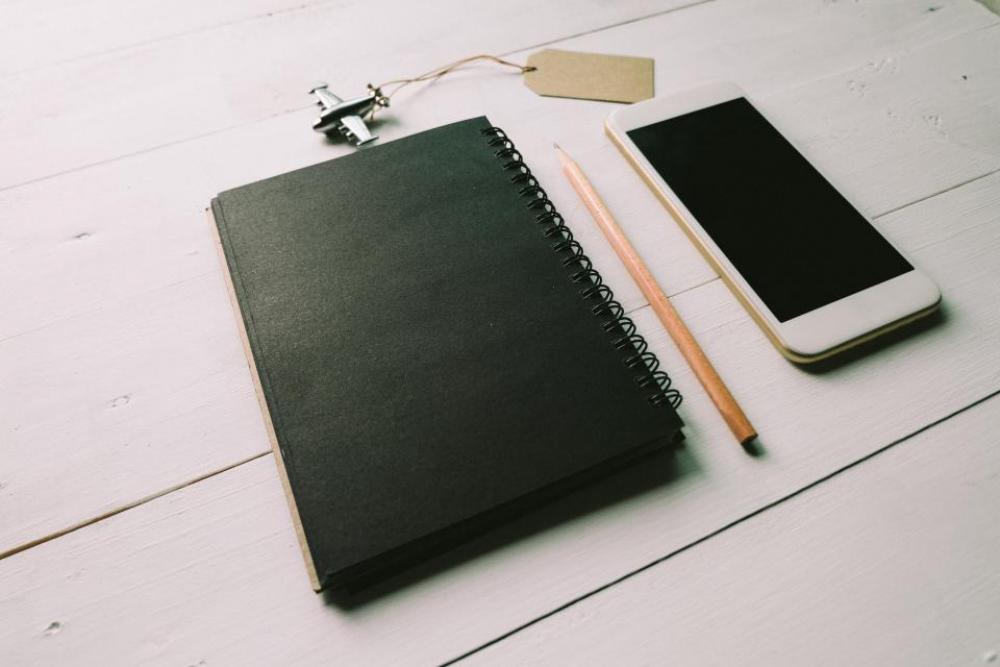 black notebook pencil mobile phone black notebook pencil mobile phone