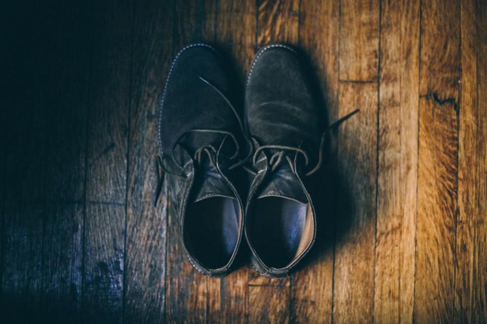 black shoe footwear wooden floor black shoe footwear wooden floor