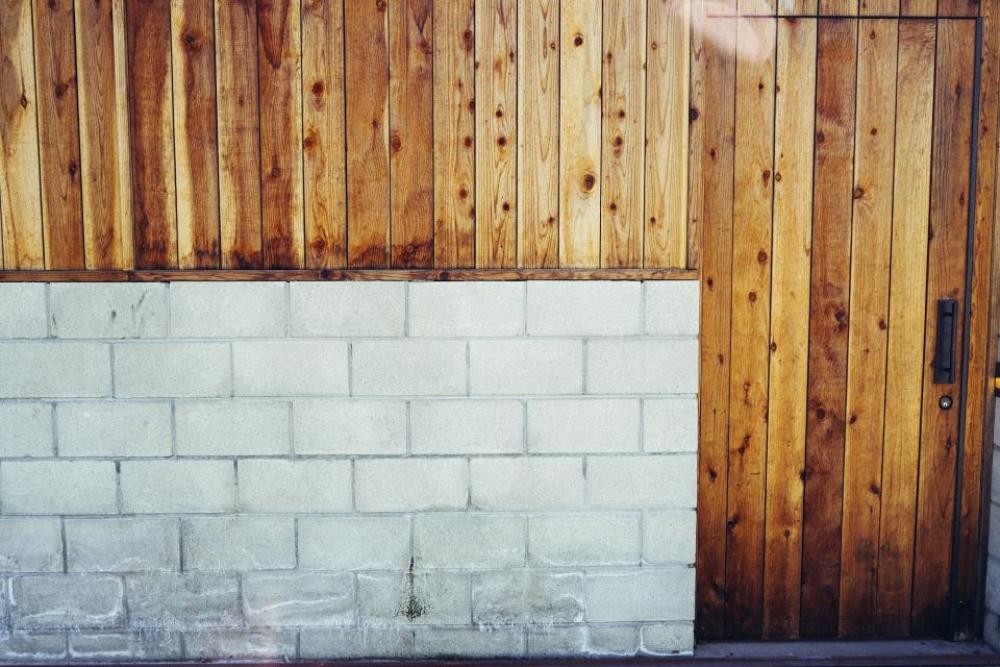 concrete cinder blocks wood paneling door handle concrete cinder blocks wood paneling door handle