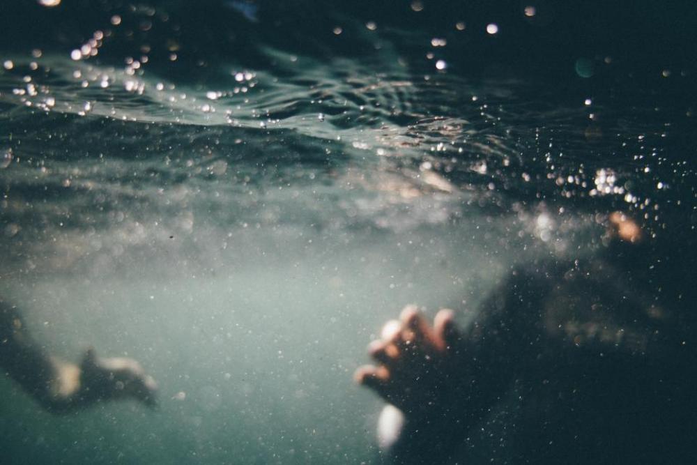 underwater swimming people ocean sea underwater swimming people ocean sea
