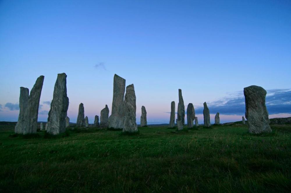 green grass highland rocks stone green grass highland rocks stone