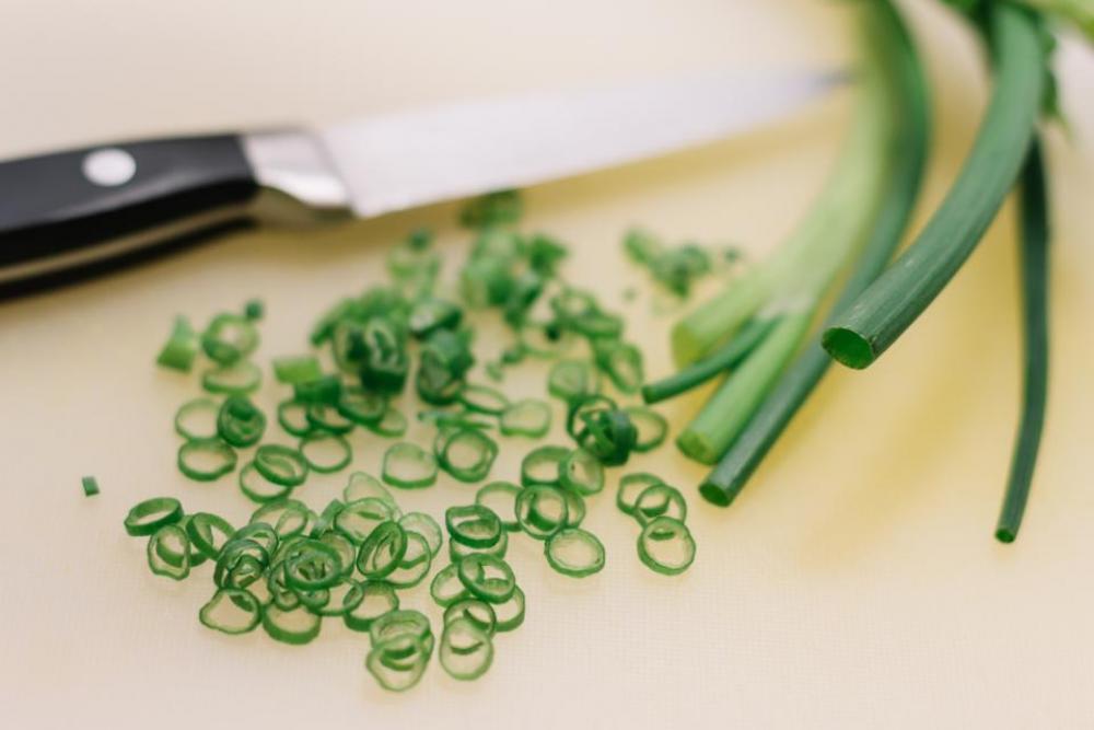 green onion vegetables food knife chef green onion vegetables food knife chef