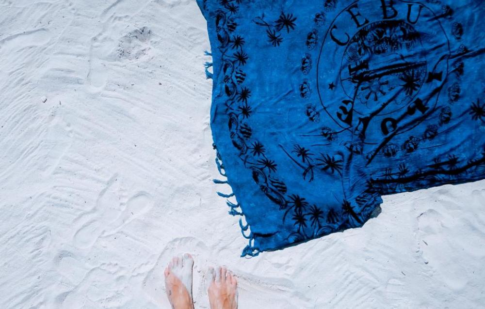 white sand beach blue shawl white sand beach blue shawl