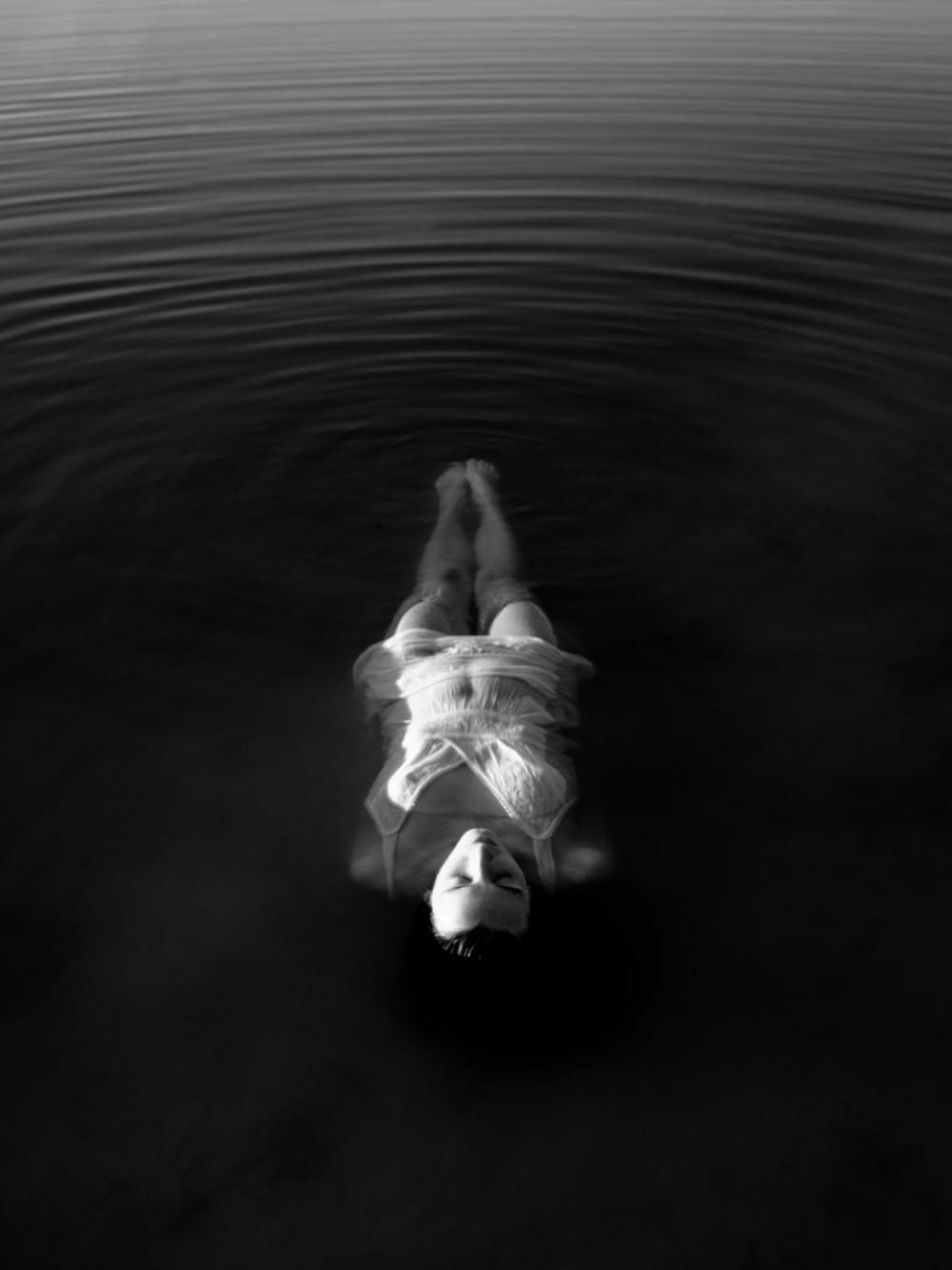 people woman swimming floating water people woman swimming floating water