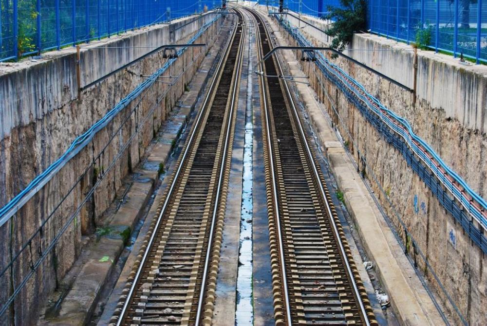 train tracks railroad fence empty blue train tracks railroad fence empty blue