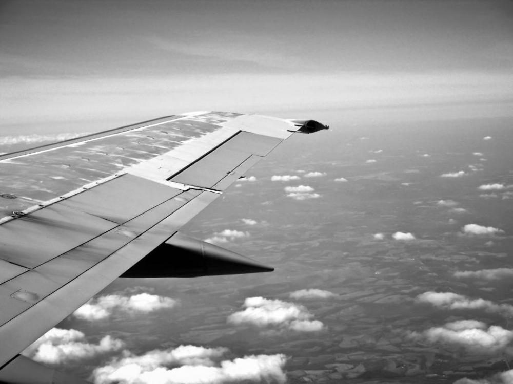 airplane wing flying sky above the clouds airplane wing flying sky above the clouds