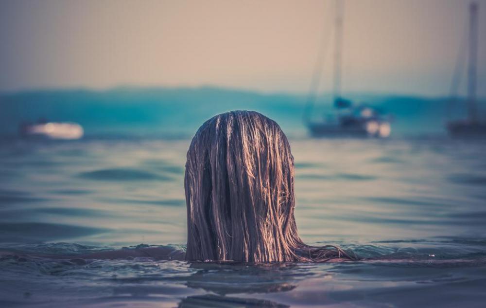girl swimming lake ocean sea girl swimming lake ocean sea