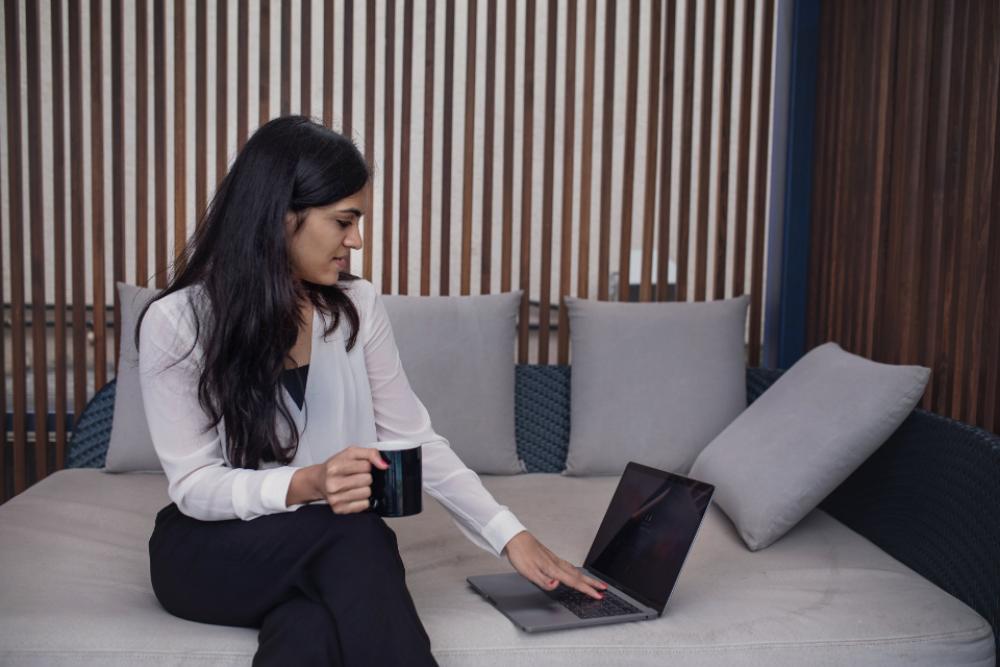 woman laptop sitting coffee working woman laptop sitting coffee working