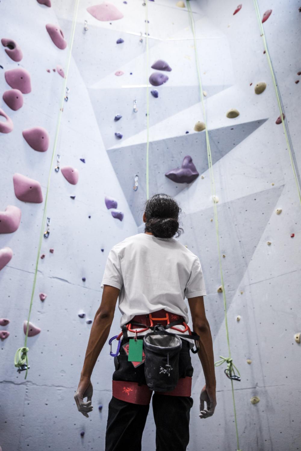 indoors rock climber wall climb exercise indoors rock climber wall climb exercise