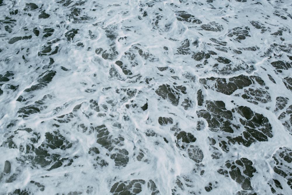 ocean water close up waves bubbles ocean water close up waves bubbles