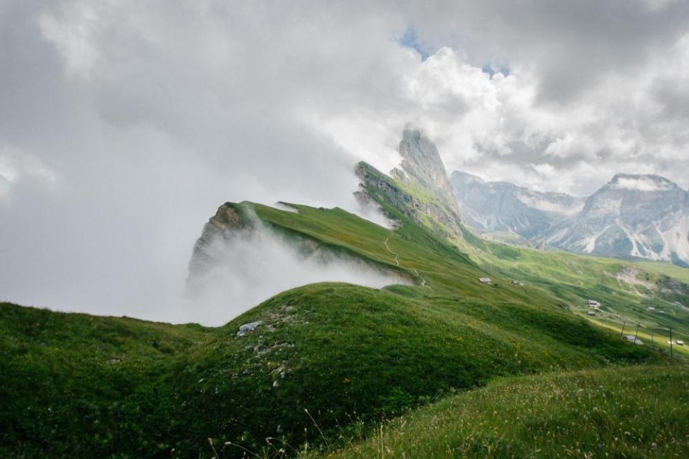 green grass highland grassland clouds green grass highland grassland clouds