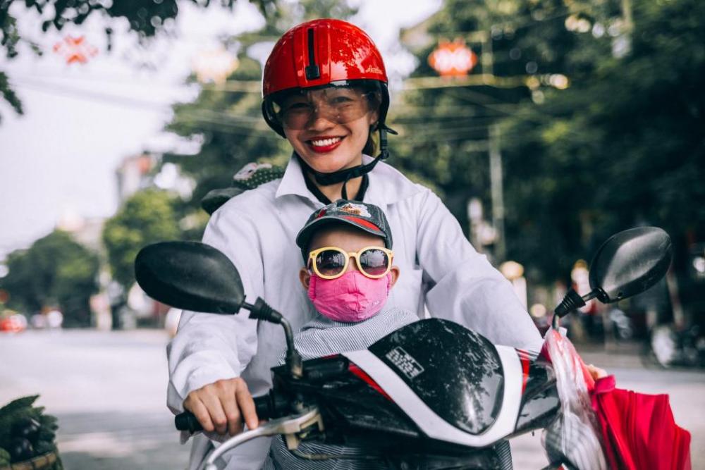 mother son riding motorcycle helmet mother son riding motorcycle helmet