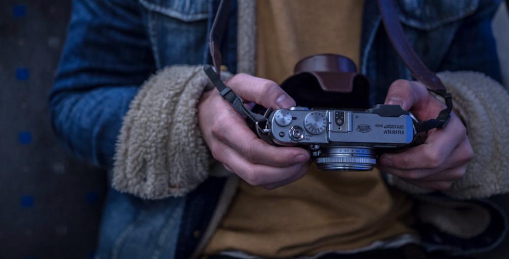 adventure camera coat hands man adventure camera coat hands man