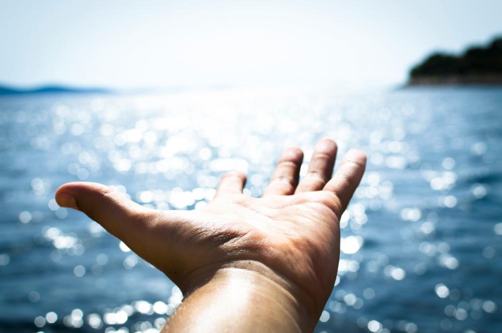 hand freedom man travel sea hand freedom man travel sea