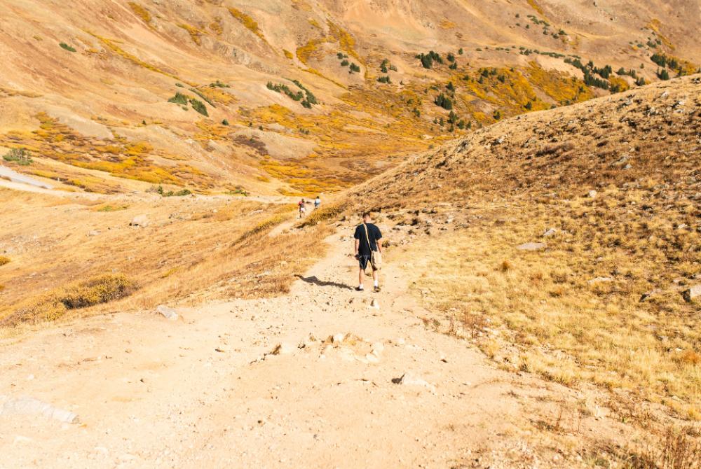 hiking rocky mountains colorado person hiking rocky mountains colorado person