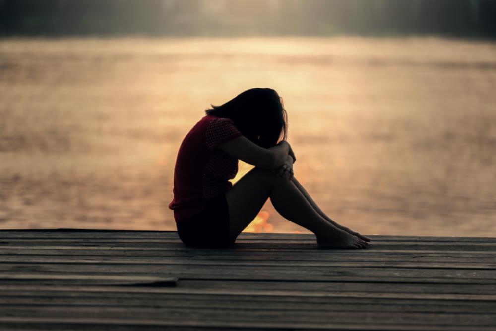 woman pier water think pensive woman pier water think pensive