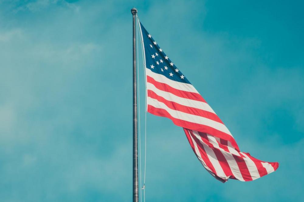 american flag blue sky United States american flag blue sky United States