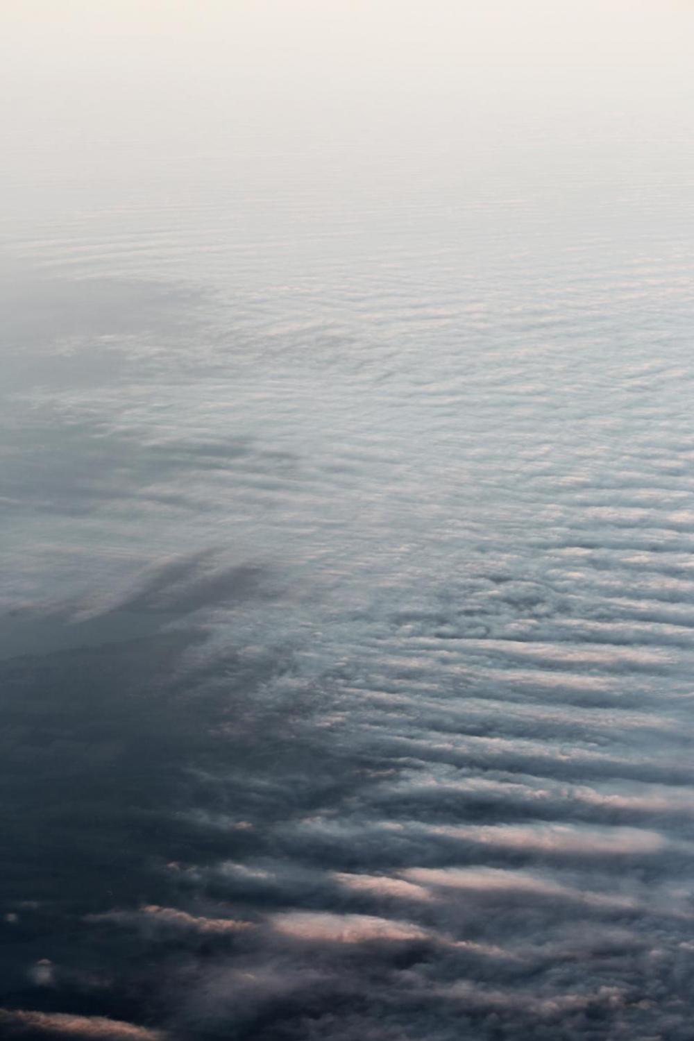above the clouds sky aerial view above the clouds sky aerial view