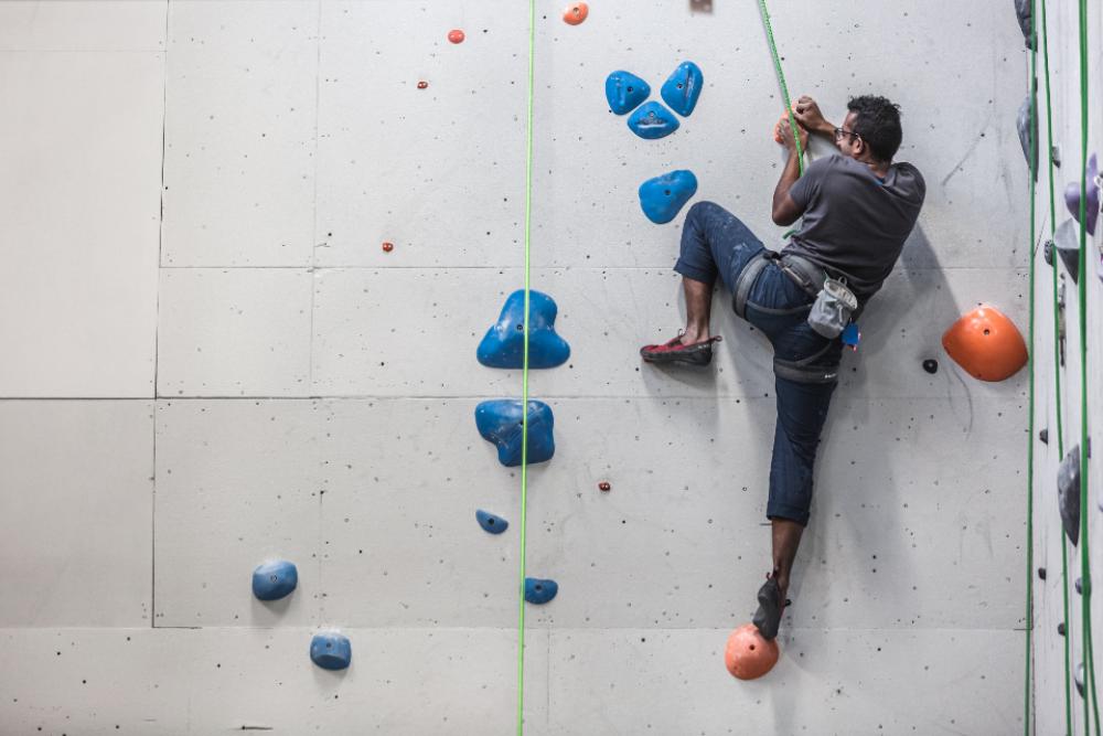indoors rock climbing person man indoors rock climbing person man