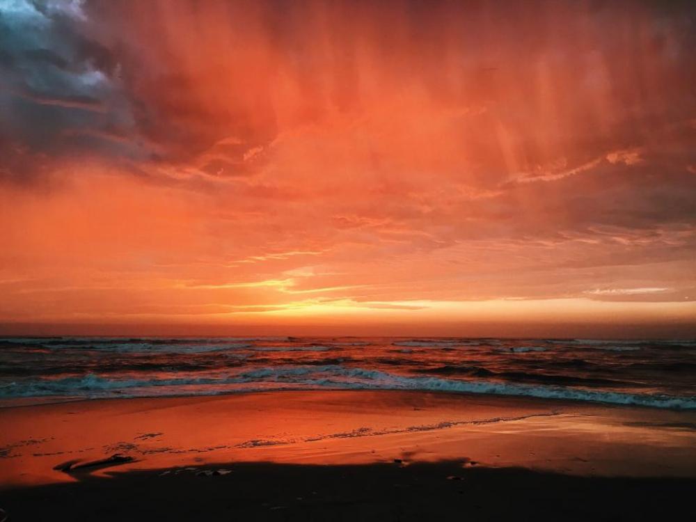 red sky clouds beach coast red sky clouds beach coast