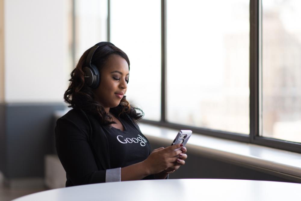 woman headphones mobile device computer woman headphones mobile device computer