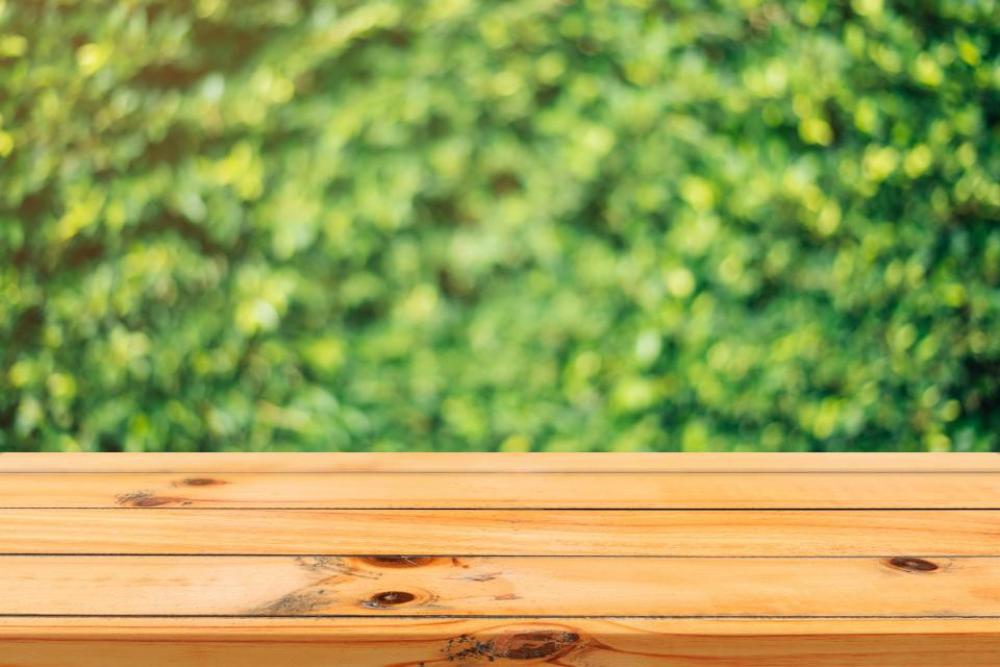 wood wooden table outside bokeh wood wooden table outside bokeh