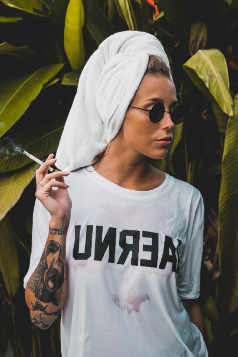 woman model smoking cigarette wet woman model smoking cigarette wet