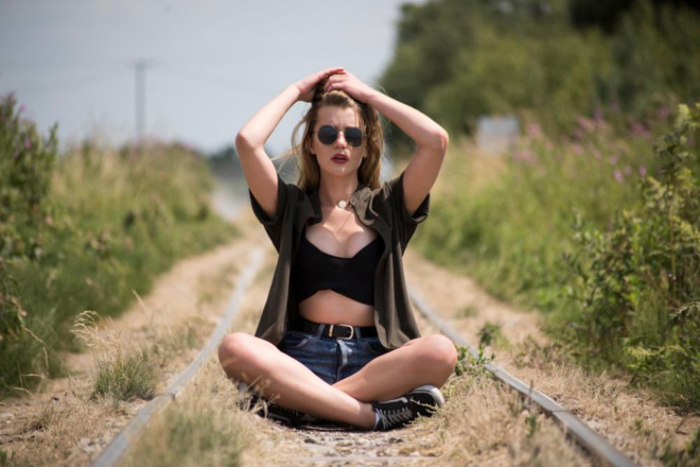 girl sitting outdoors pose portrait girl sitting outdoors pose portrait
