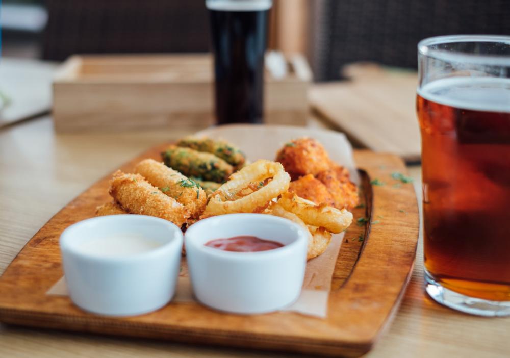 snacks wooden plate beer pint snacks wooden plate beer pint