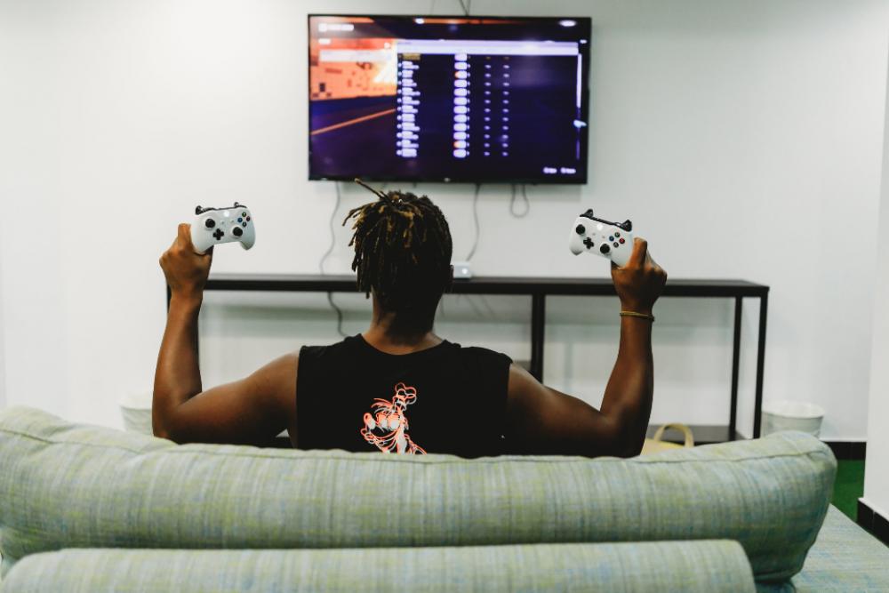 video game joystick man couch video game joystick man couch