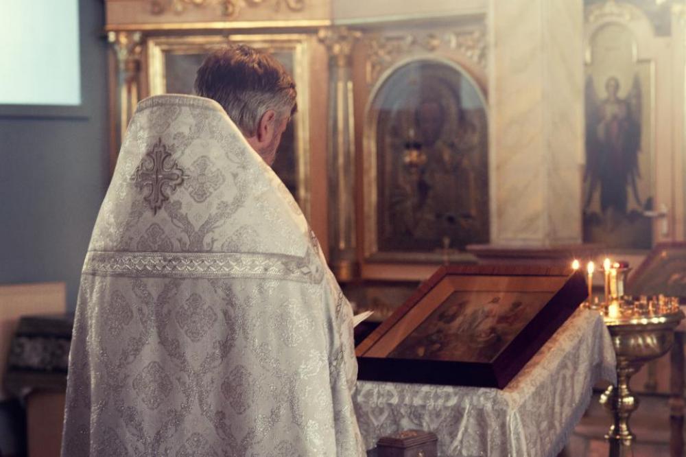 priest back church holy candle priest back church holy candle