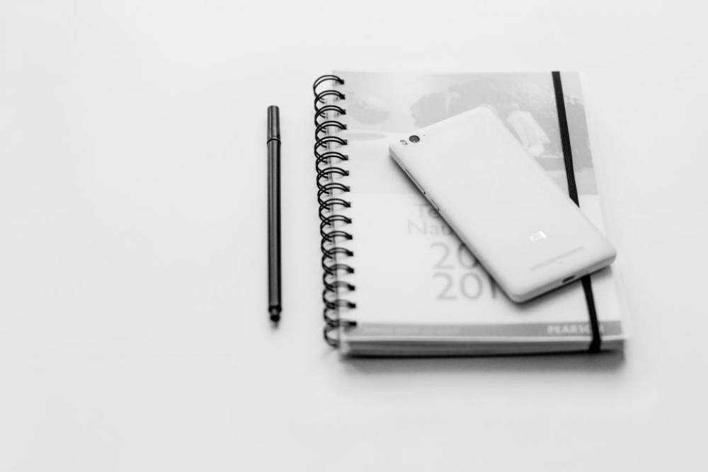 black and white notebook pen mobile phone black and white notebook pen mobile phone