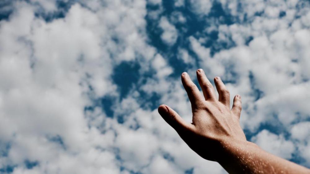 hands fingers arm cloudy blue hands fingers arm cloudy blue