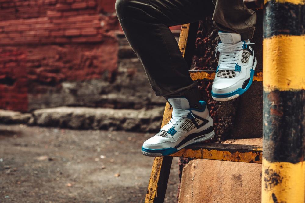 Wearing Sneakers On Ladder Photo Wearing Sneakers On Ladder Photo