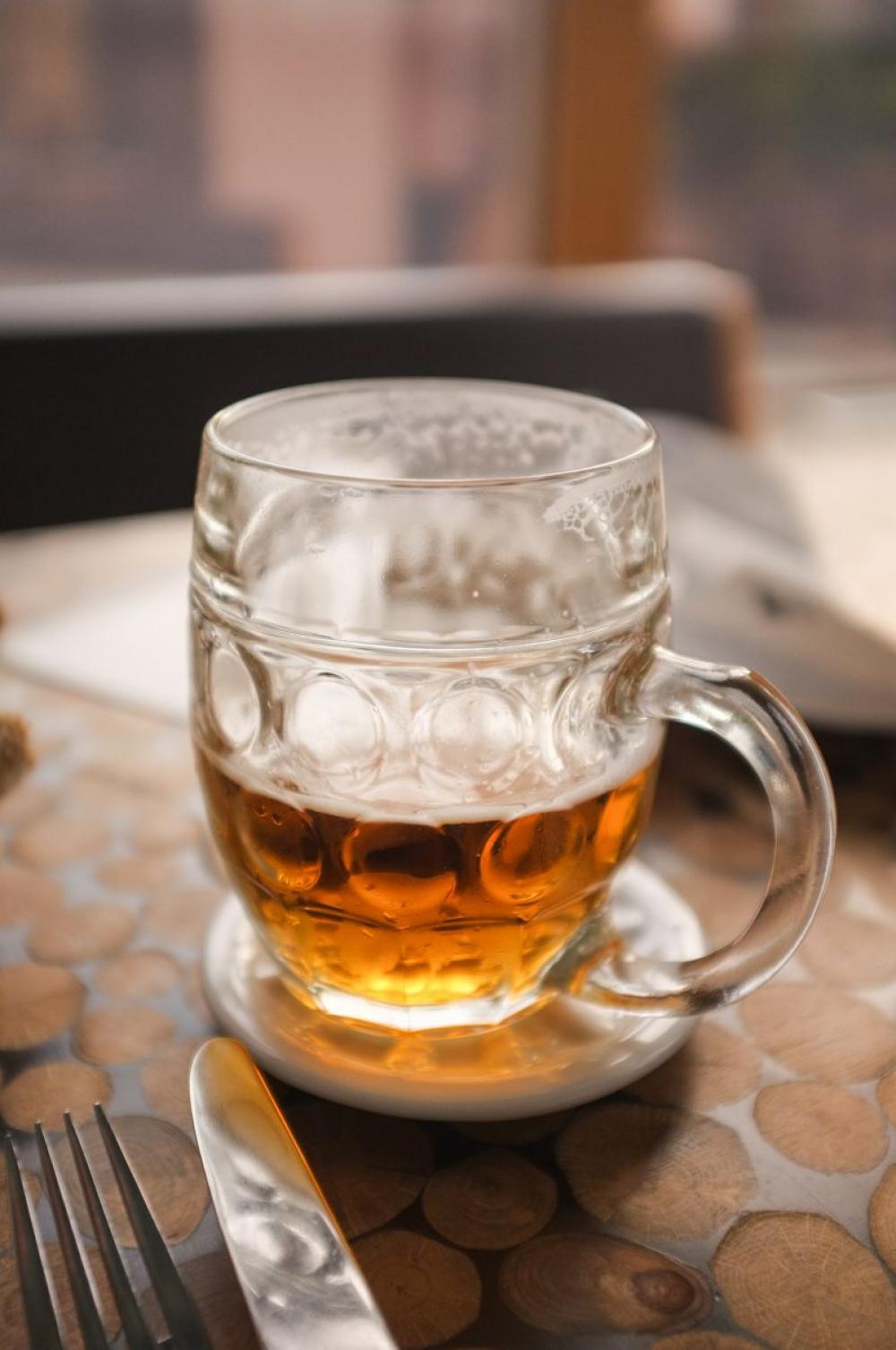 Half-full glass of beer Half-full glass of beer