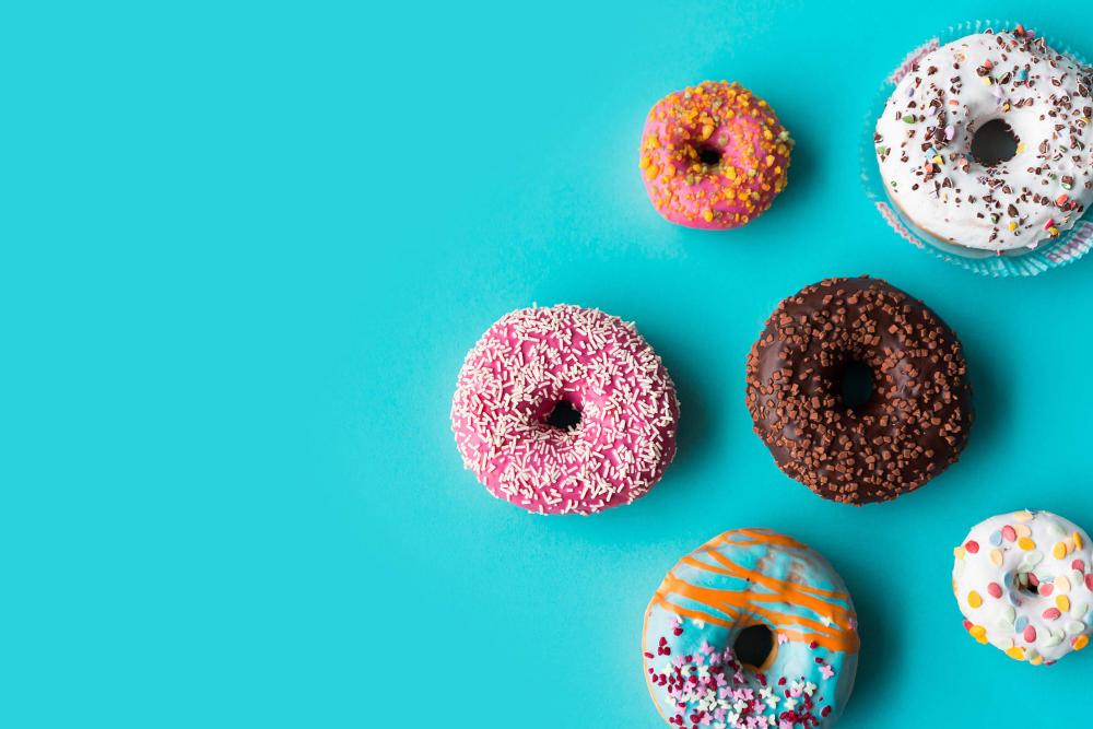 Donuts on Blue Background Free Photo Donuts on Blue Background Free Photo