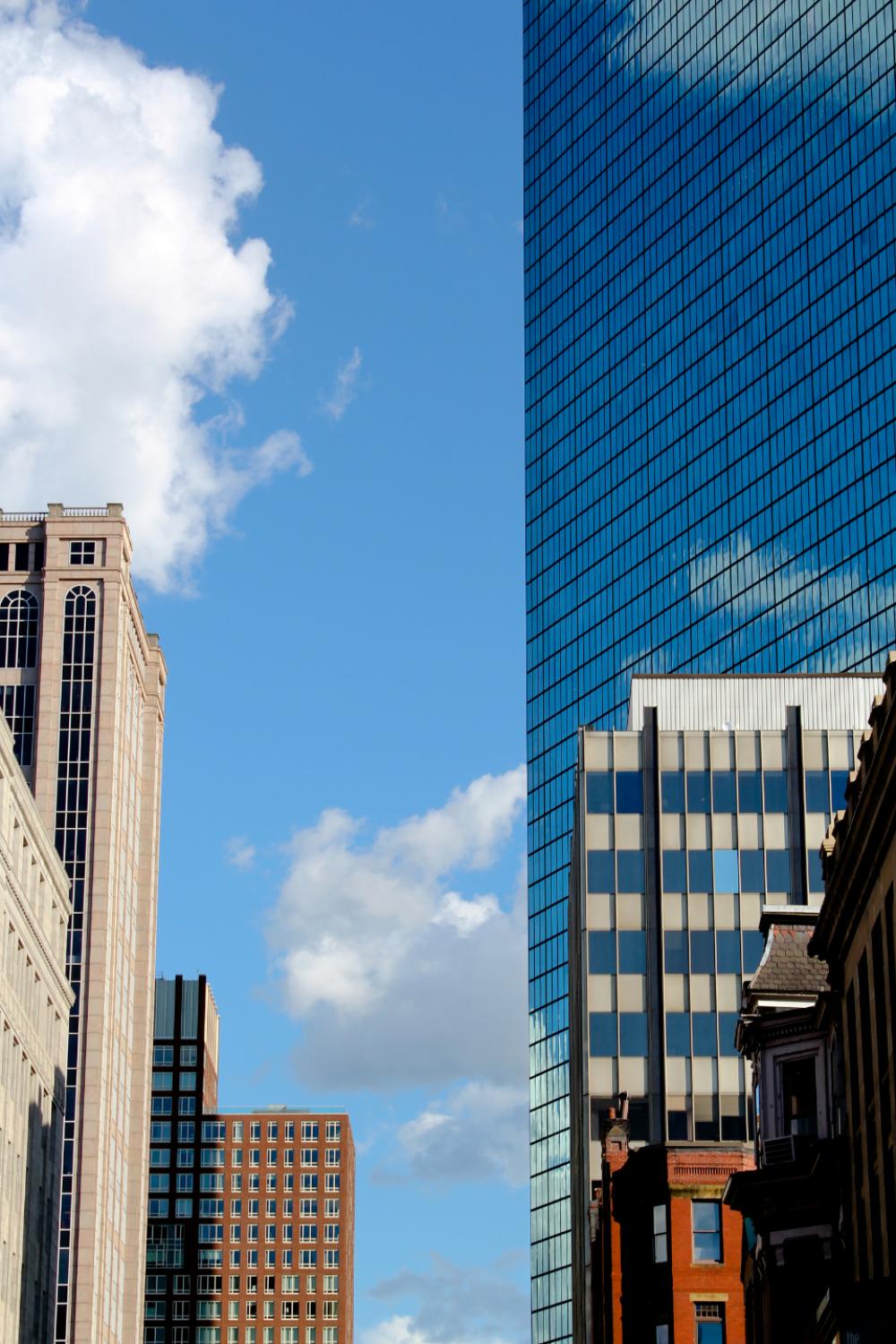 city building windows sky clouds city building windows sky clouds