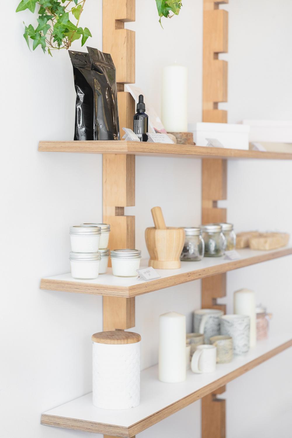 Jars, Candles And Ceramics On Wooden Shelves Photo Jars, Candles And Ceramics On Wooden Shelves Photo