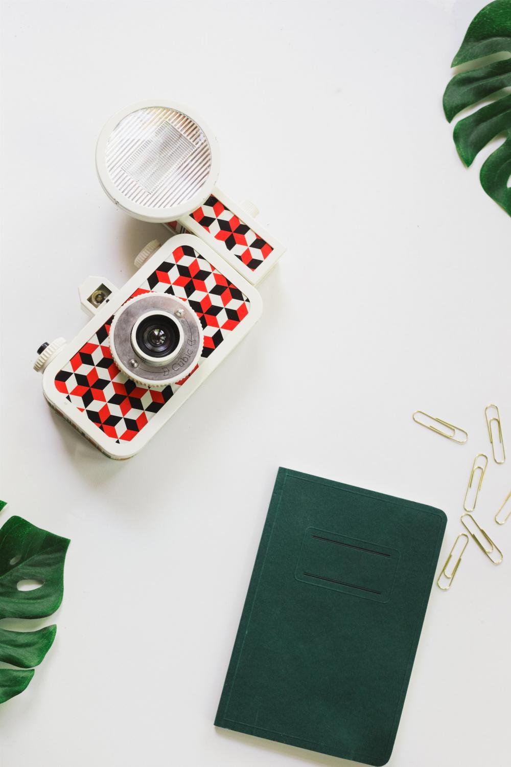 Trendy Camera And Notebook Photo Trendy Camera And Notebook Photo