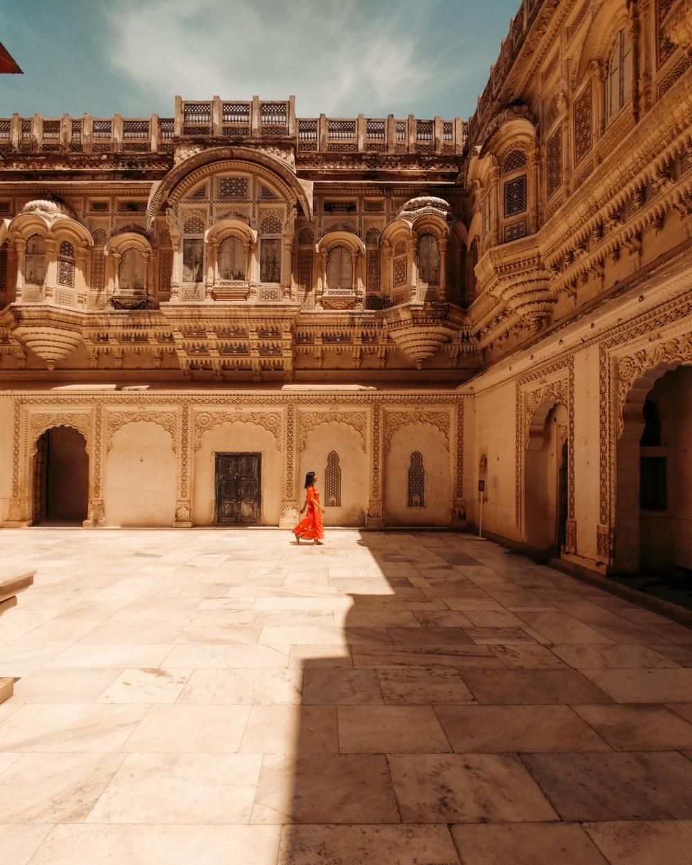 Woman In Courtyard Photo Woman In Courtyard Photo