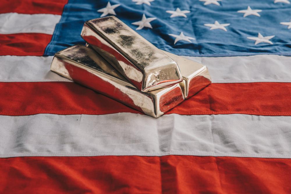 Gold Bars On An American Flag Photo Gold Bars On An American Flag Photo